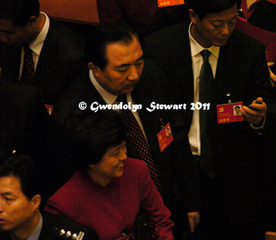 DELEGATES 
DEPARTING THE 17th CONGRESS OF THE CHINESE COMMUNIST PARTY Photographed by 
GWENDOLYN STEWART c. 2011; All Rights Reserved