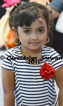 In the Audience at a Beauty Contest 
at the Plaza Ambarrukmo, Yogyakarta, Indonesia, Photographed by 
Gwendolyn Stewart c. 2014; All Rights Reserved